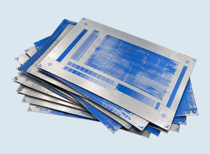 Worn aluminium printing plates stacked for recycling